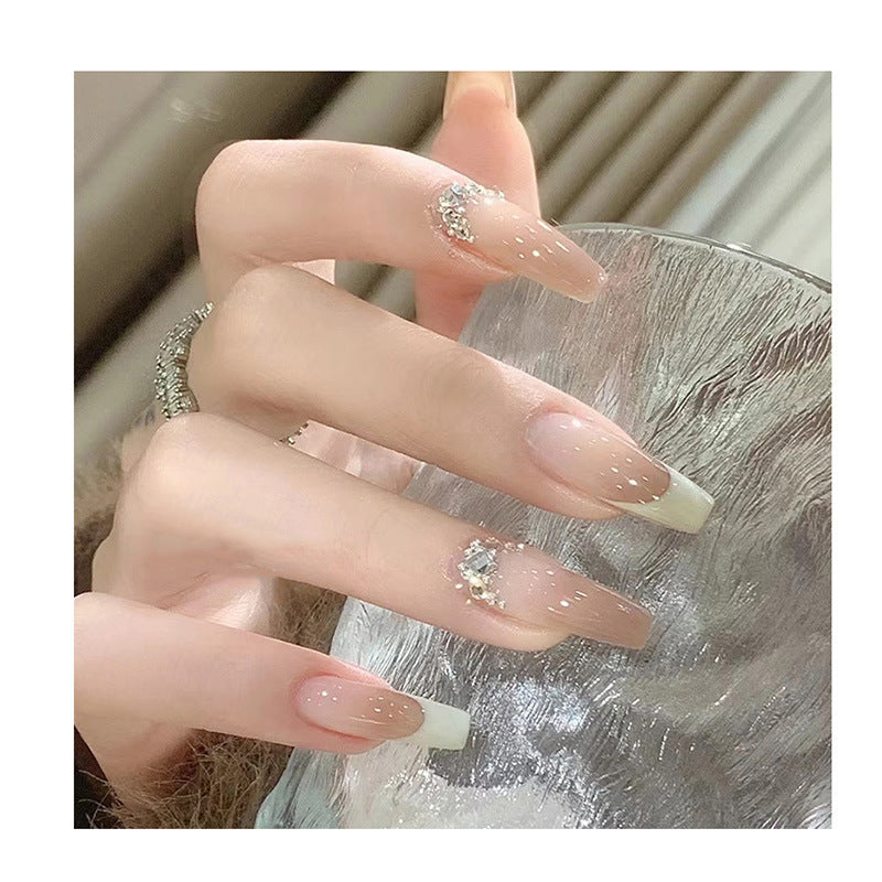 Artful stiletto nails with rhinestone accents Stornfield