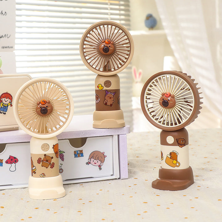Unisex portable hand and table fan with LED color change and quiet motor Stornfield