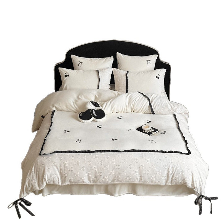 Reversible cotton satin bedding set with embroidered cherry, delicate frill and decorative bows Stornfield