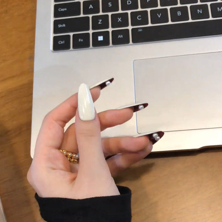 Glamorous artificial nails with elegant accents Stornfield