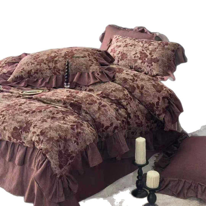 Quilted bed set in vintage look made from cotton blend with velvety floral pattern appearance and ruffle