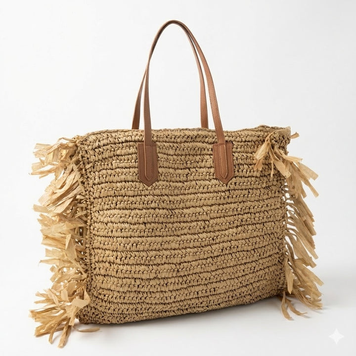 Stylish straw bag with fringed details Stornfield