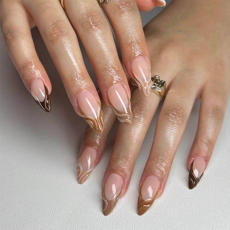 Acrylic nail set with elegant marble pattern and glossy finish Stornfield