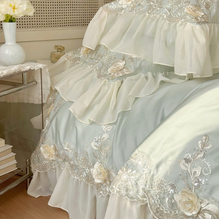 Luxurious embroidered bedding set with ruffles and lace