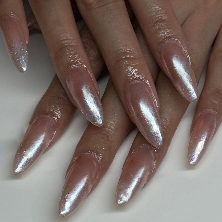 Artistic stiletto nails with glitter gradient and elegant design Stornfield