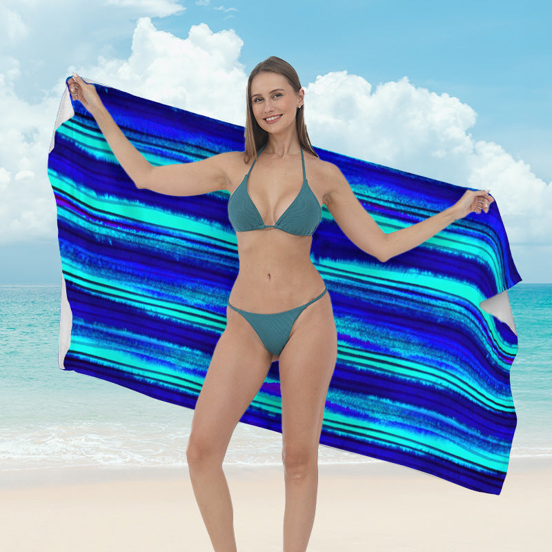 Beach towel with vibrant tropical plant motif Stornfield