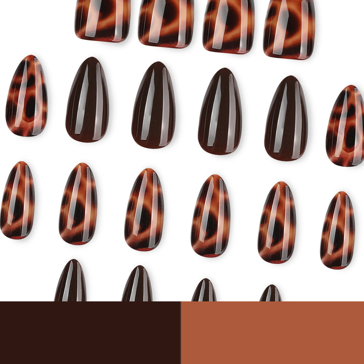Artful stiletto nails with elegant leopard pattern Stornfield