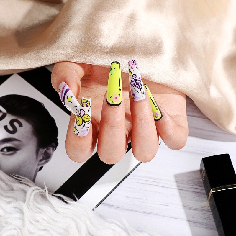 Artificial nails in creative flower design Stornfield