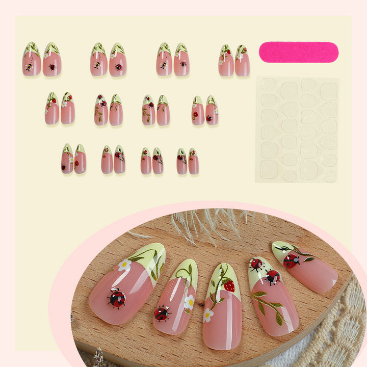 Artificial nail set with delicate flower and ladybird pattern Stornfield