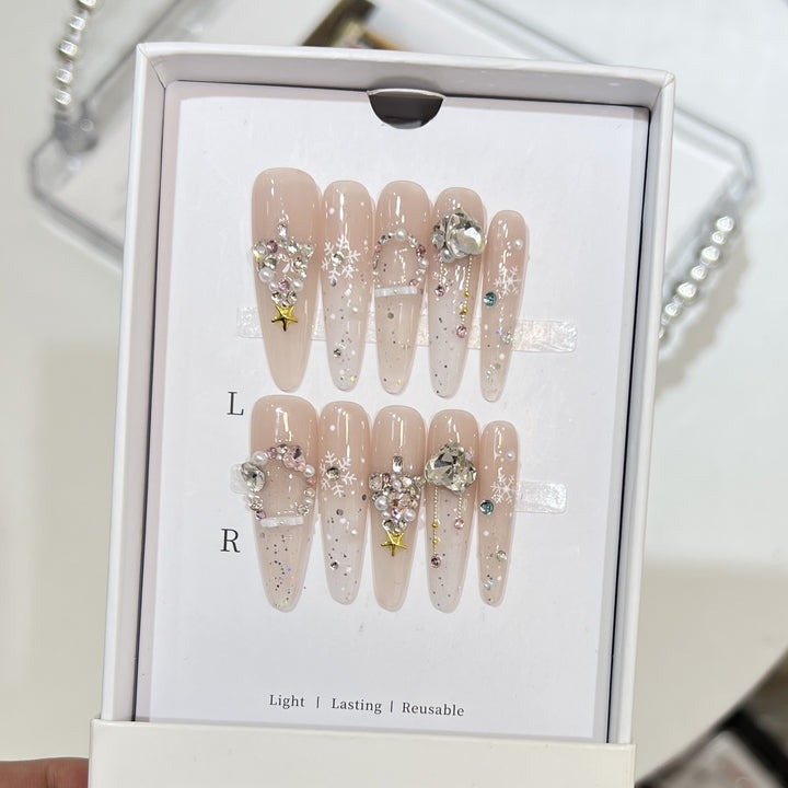 Artistic Press-On Nail Set with Snowflake and Gemstone Designs Stornfield