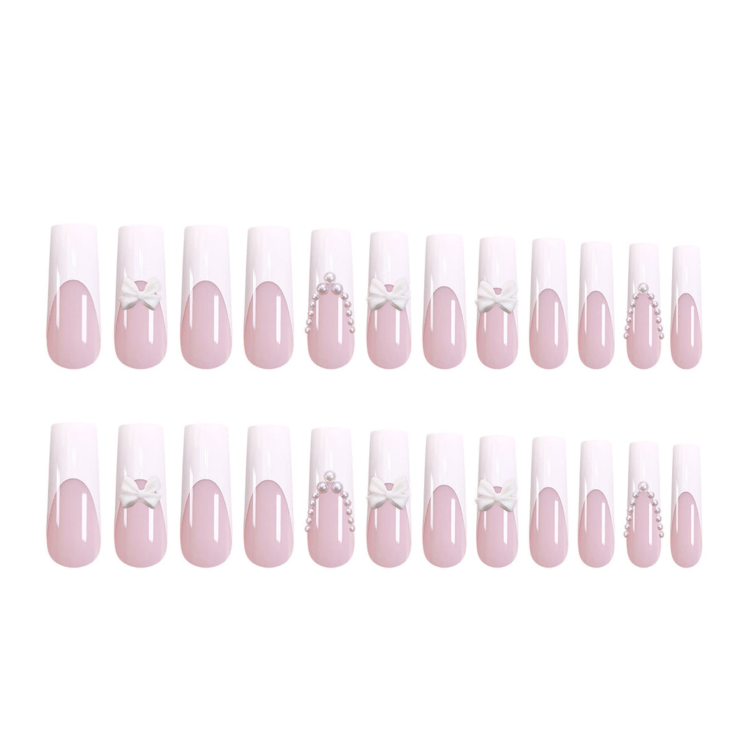 Artistic and elegant acrylic nails with pearl and flower decor Stornfield