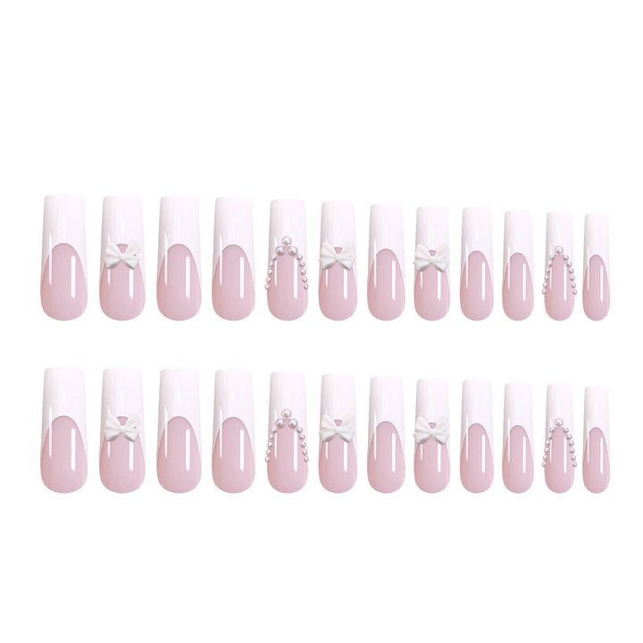 Artistic and elegant acrylic nails with pearl and flower decor Stornfield