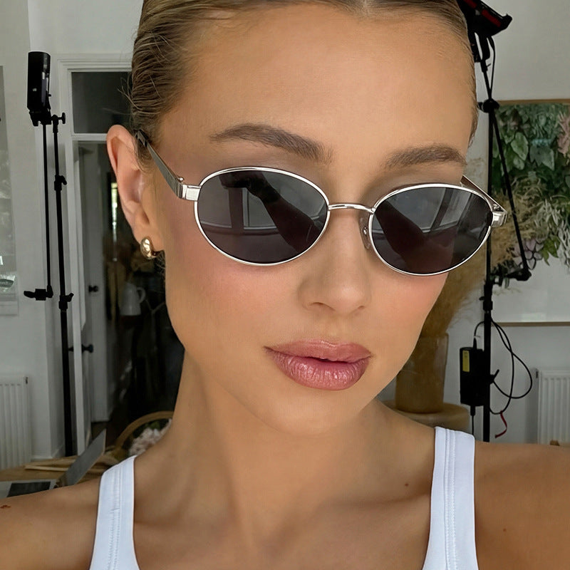 Women's fashionable sunglasses in an elegant oval design with a high-quality metal frame Stornfield