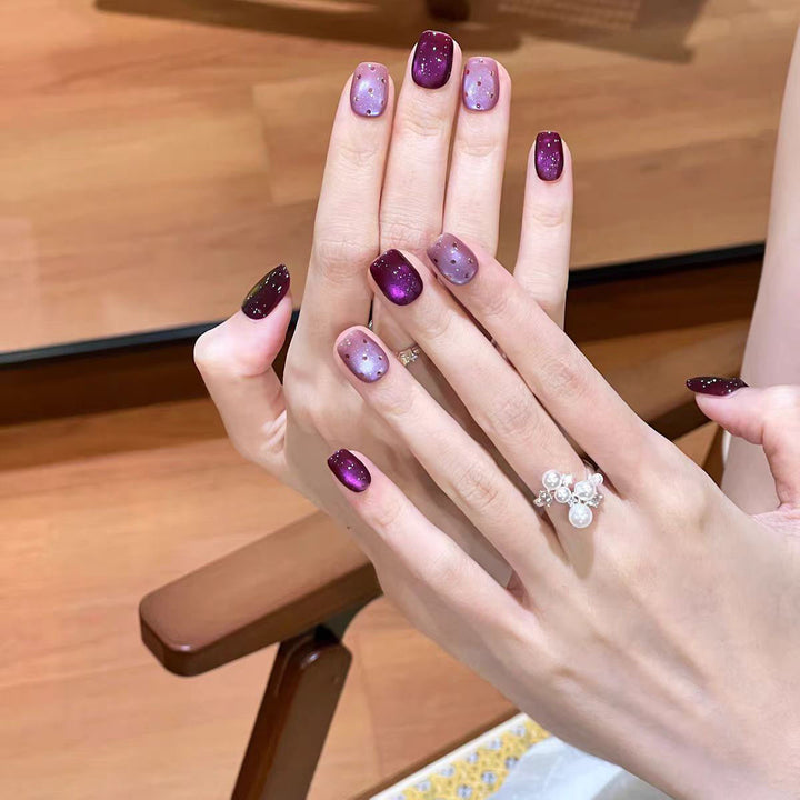 Artificial nails with ombre effect and glitter Stornfield