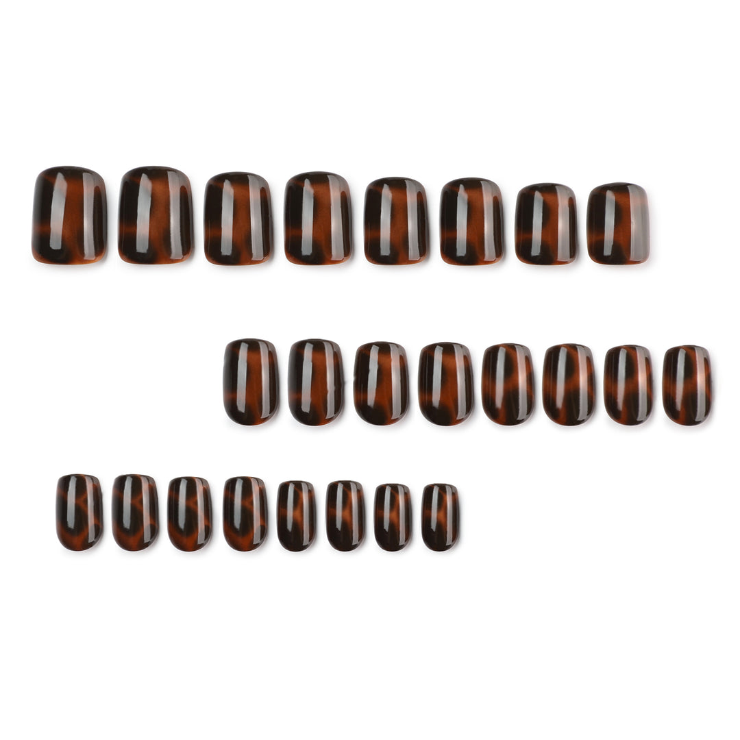 Artificial nail extensions with elegant tortoiseshell decor Stornfield