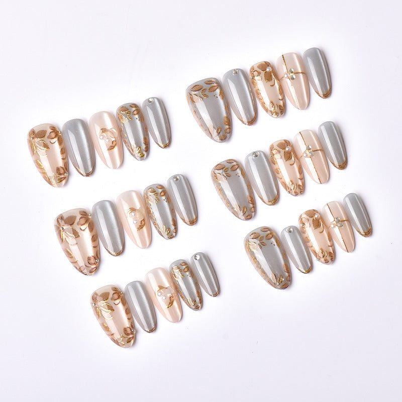 Decorative Press-On Nail Art Set with Floral and Metallic Accents Stornfield