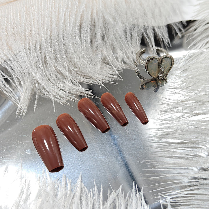 Artificial nails in elegant high gloss with stiletto shape Stornfield