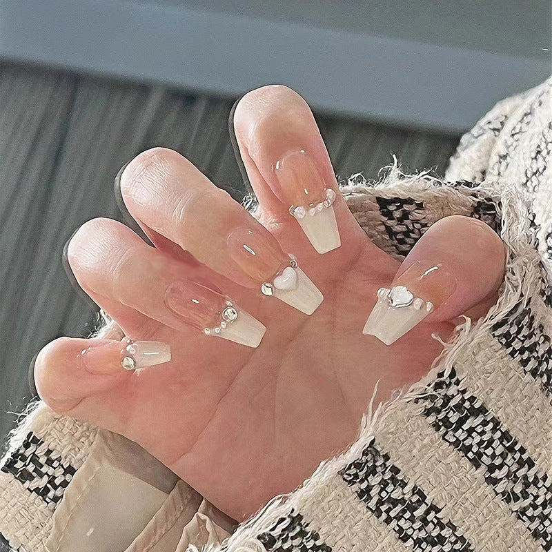 Artificial nail set with elegant flower and glitter decorations Stornfield