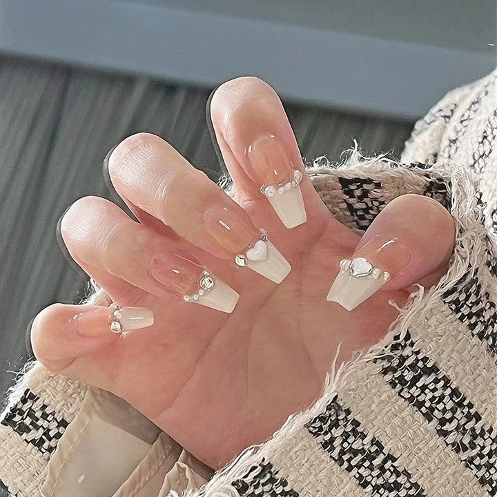 Artificial nail set with elegant flower and glitter decorations Stornfield