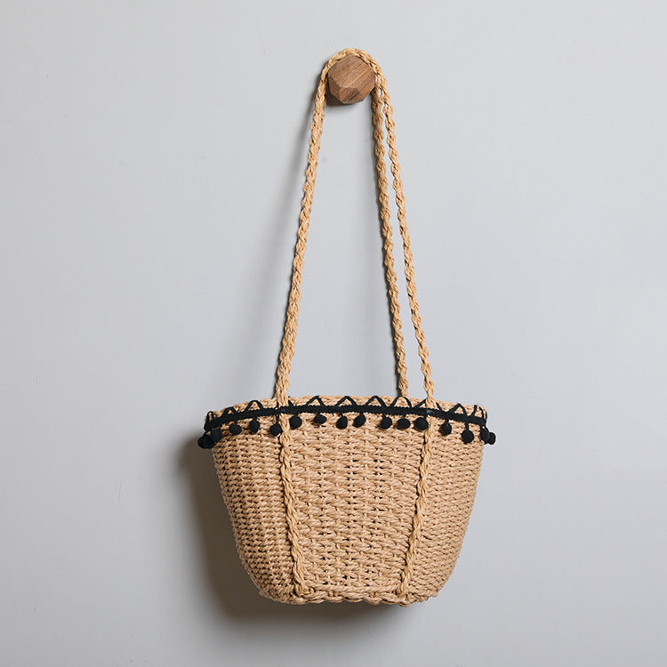 Delicate beach bag with pompons Stornfield