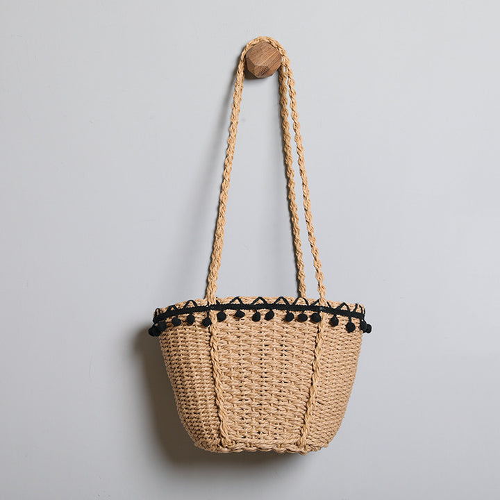 Delicate beach bag with pompons Stornfield