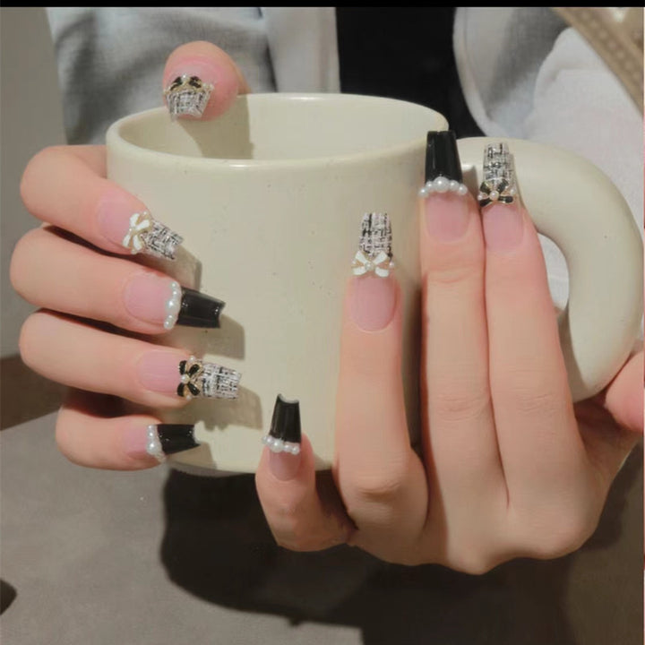Glamorous nail designs with pearl and rhinestone accents Stornfield