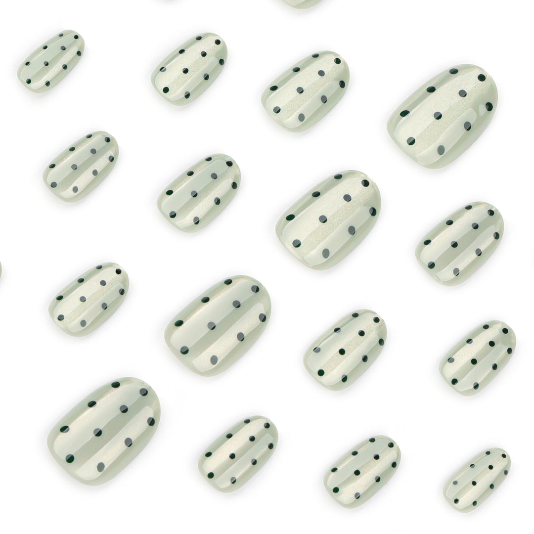 Creative Nail Art with Polka Dot Pattern Stornfield