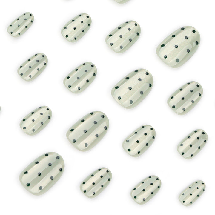 Creative Nail Art with Polka Dot Pattern Stornfield