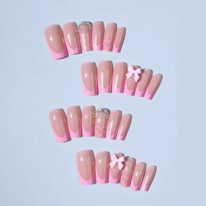 Artificial nail set with romantic bows and heart patterns Stornfield