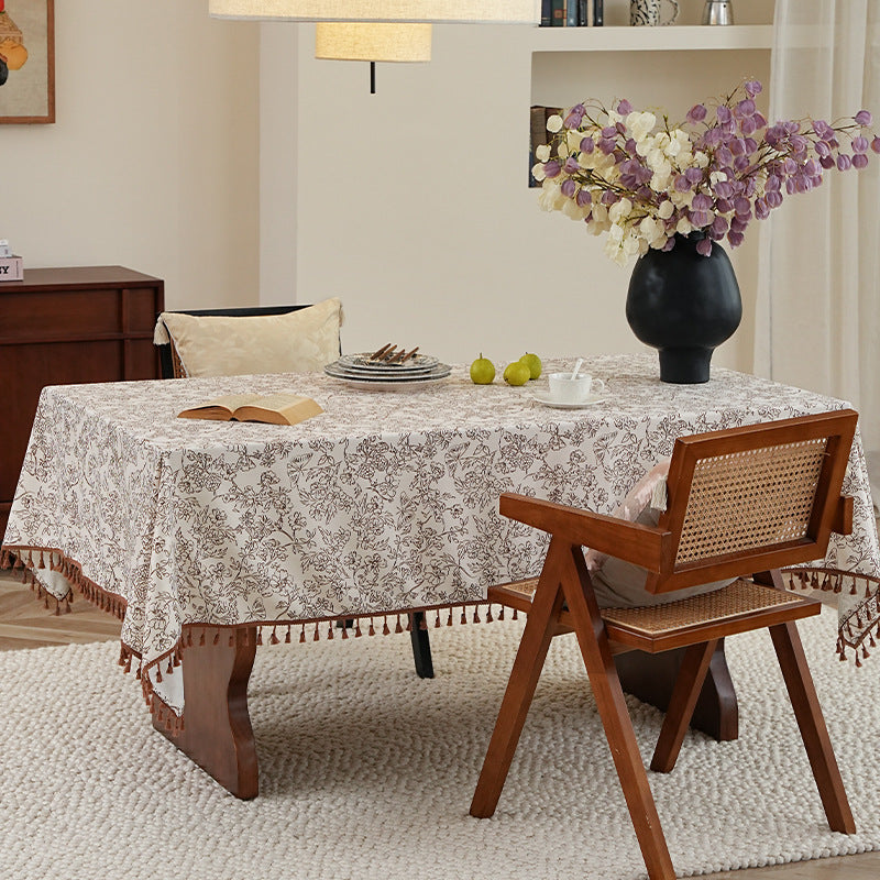 Tablecloth made of cotton blend fabric with floral jacquard look and tassel trim Stornfield
