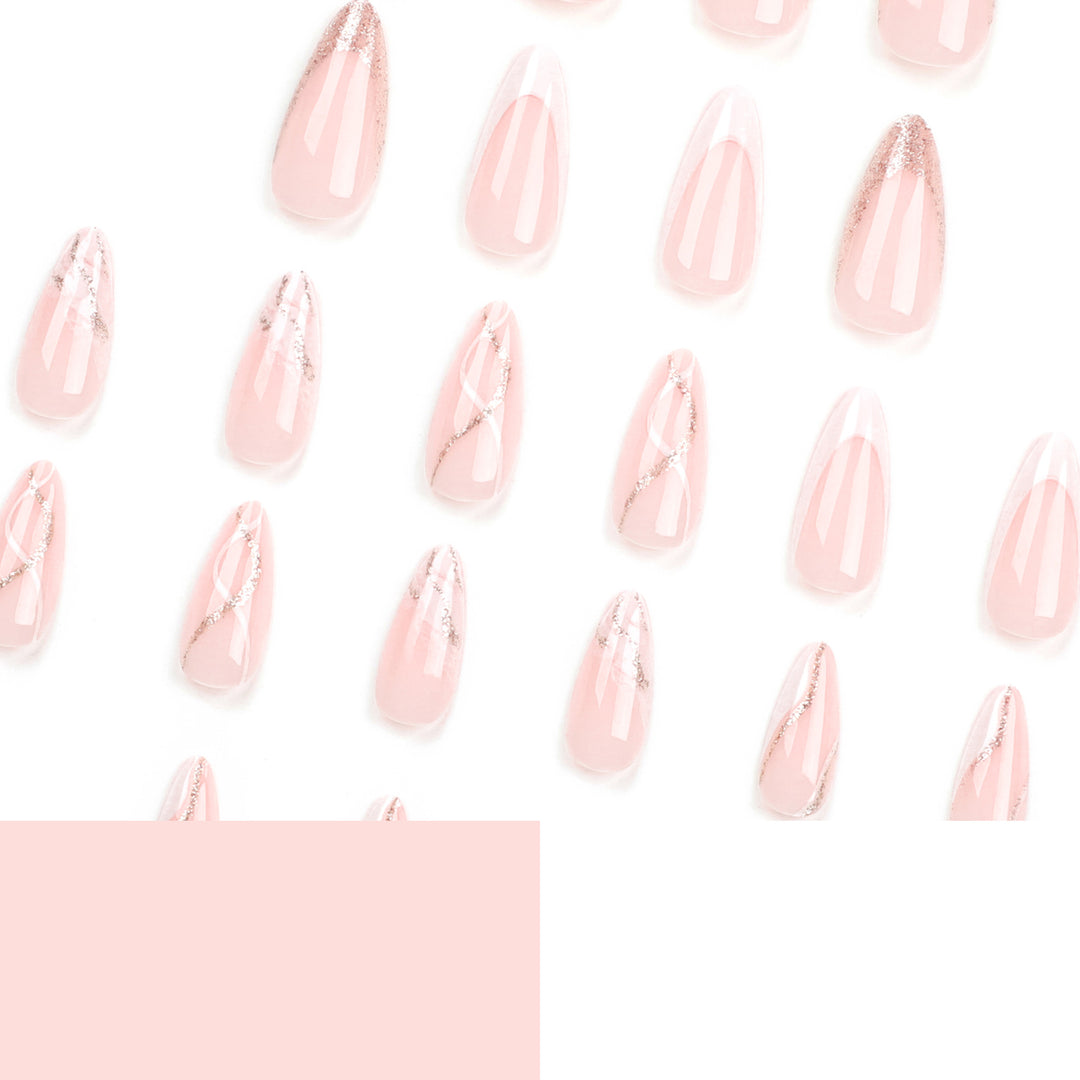 Artful stiletto nails with elegant marble and glitter design Stornfield