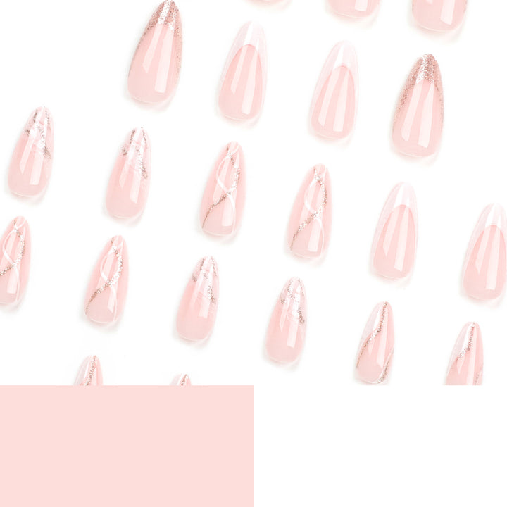 Artful stiletto nails with elegant marble and glitter design Stornfield