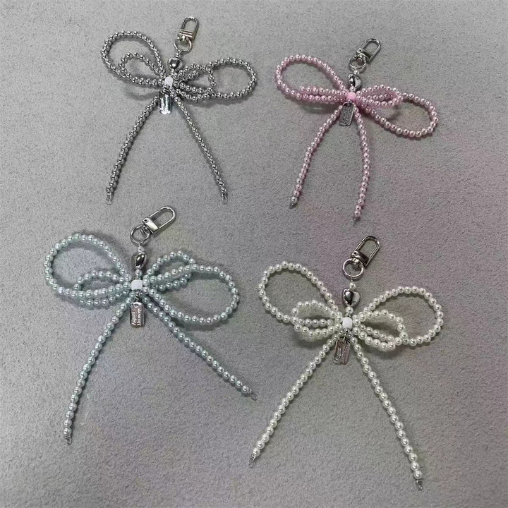 Elegant Pearl Bow Keychain Stornfield