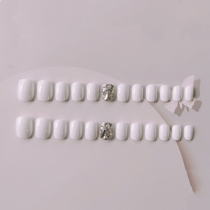 Artificial nails with glitter design and elegant accents Stornfield