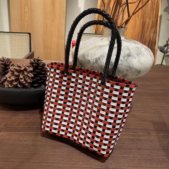 Handwoven basket bag with colorful design Stornfield