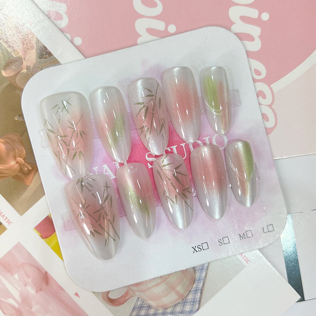 Artificial nail tips with elegant design and botanical accents Stornfield