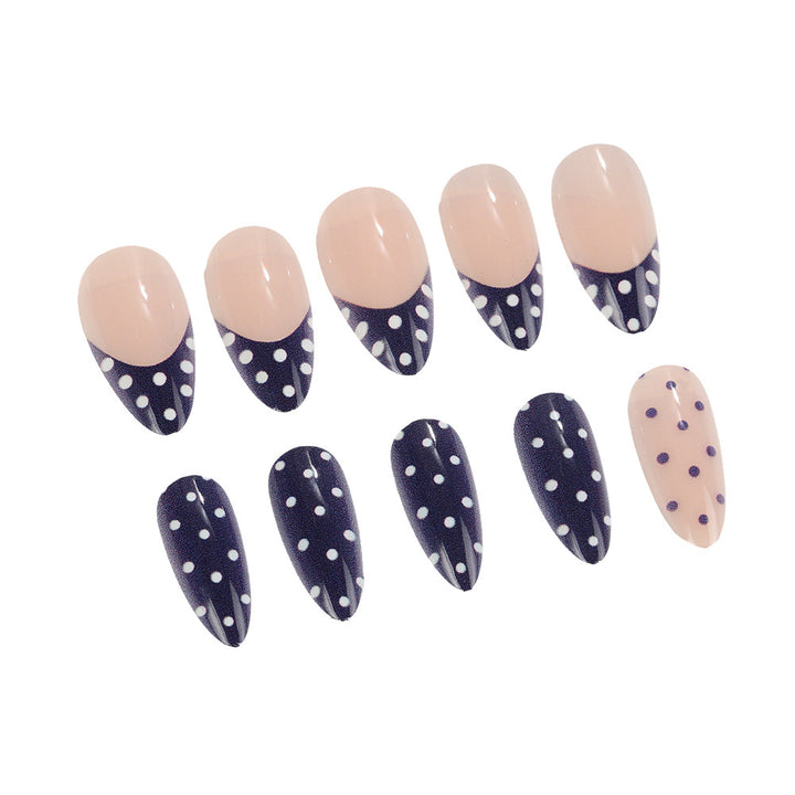 Artificial nails in modern polka dot design Stornfield