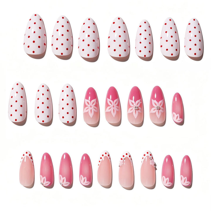 Artificial nail set with floral accents and charming polka dots Stornfield