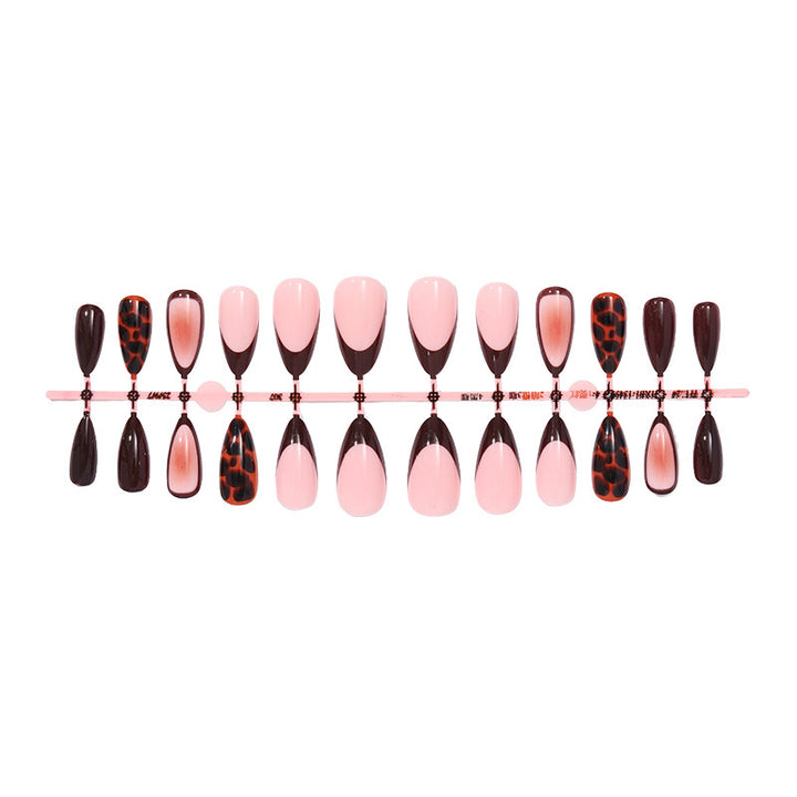 Acrylic nail set with elegant gradient and trendy animal motifs Stornfield