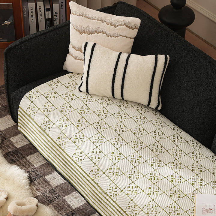 Woven rectangular table runner made of cotton blend with checkered pattern and striped border Stornfield