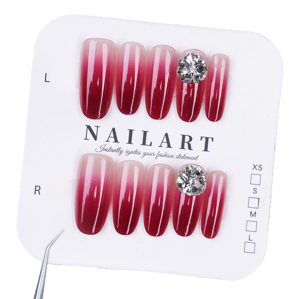 Artificial nails with elegant ombre effect and rhinestone decoration Stornfield