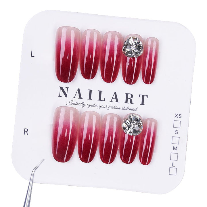 Artificial nails with elegant ombre effect and rhinestone decoration Stornfield