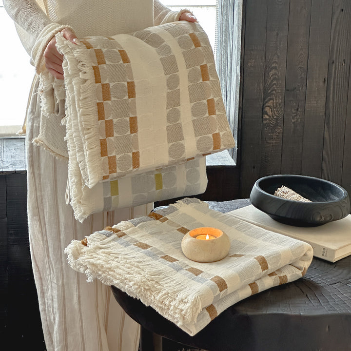 Generous cotton-linen throw blanket with geometric pattern and fringes