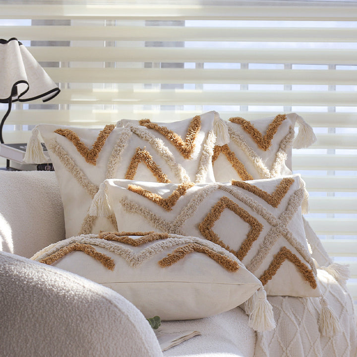 Square cushion cover made of cotton-linen with raised diamond tufting and corner tassels Stornfield