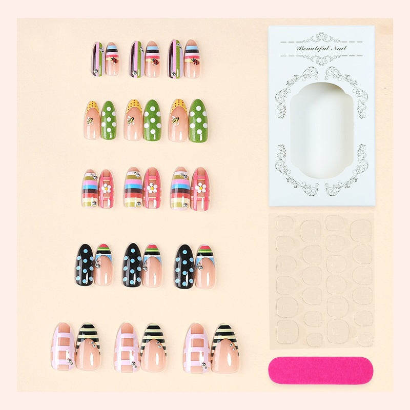 Acrylic nail set with colorful patterns and creative designs Stornfield