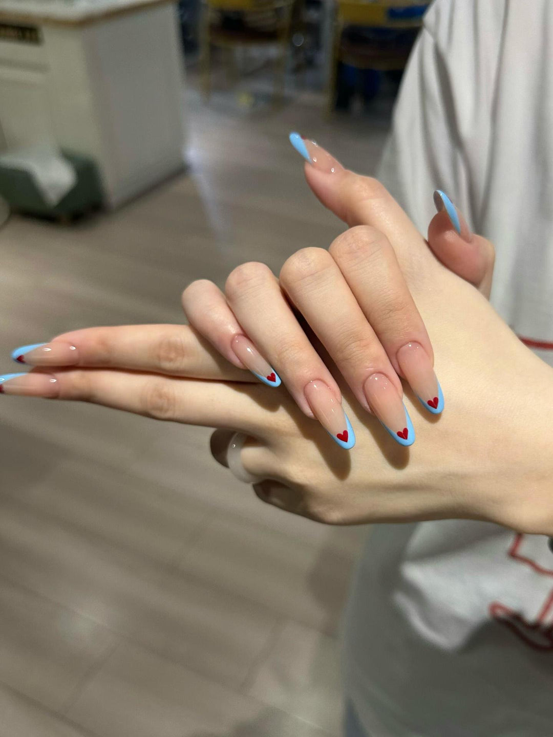 Nail art with heart-shaped design Stornfield