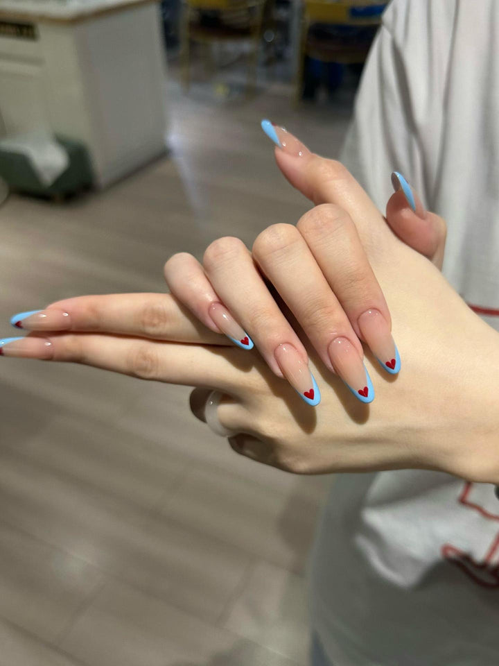 Nail art with heart-shaped design Stornfield