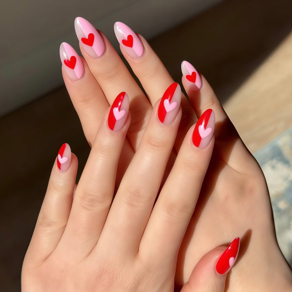 Art nails with romantic heart design Stornfield