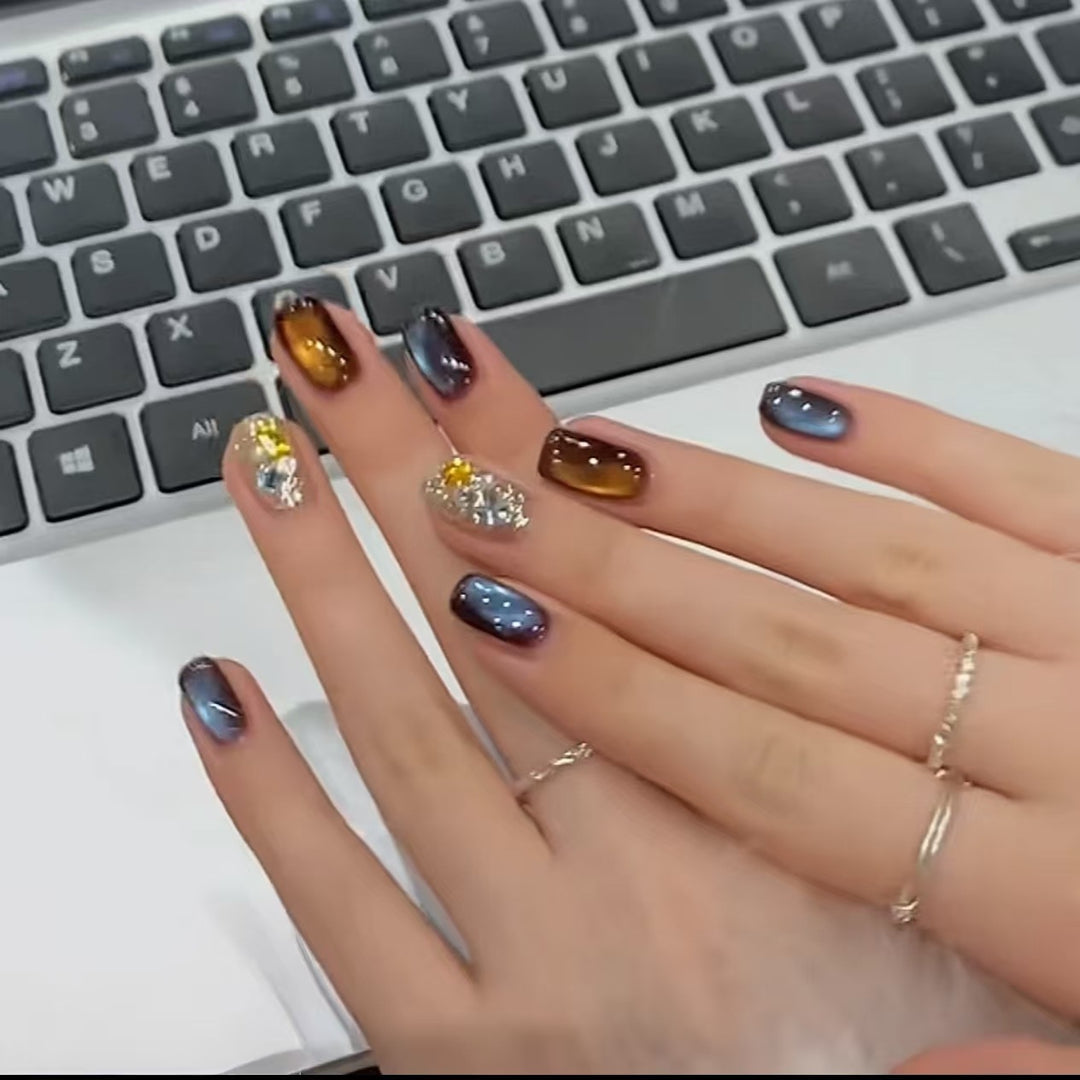Artistic Ombre Nail Extensions with Metallic Accents