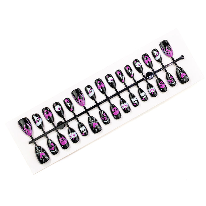 Artistic Skull-Themed Press-On Nail Art Stornfield